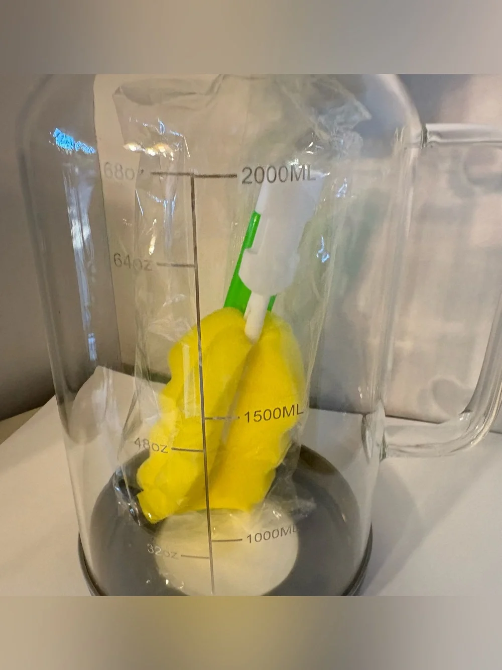 4/68 oz. Glass Pitcher with handle, lid & silicone removable base. New in Box NW